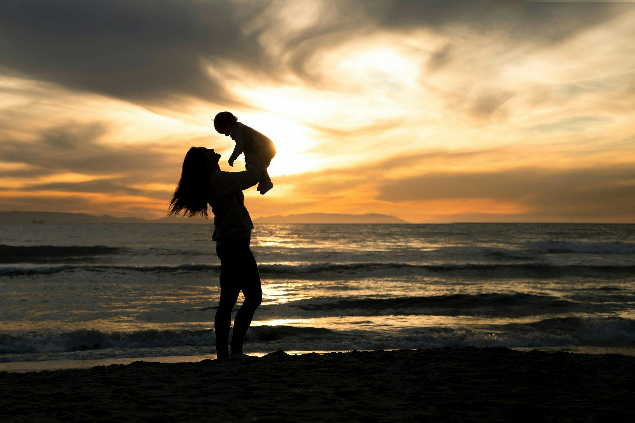 Sunset child mother
